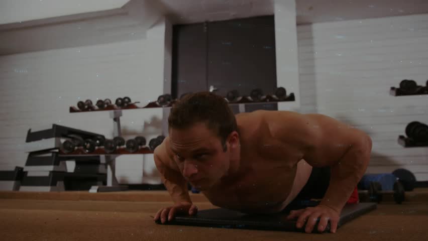 Man starting plank doing pushups on gym mat overlay growing into green or orange charts tracking reps. Athlete, bodyweight, calisthenics, dumbbells, fitness, strength, analytics