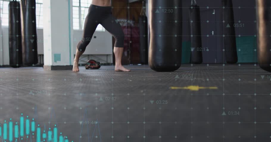 Female boxer stepping forward, kicking and punching while teal graphs and icons overlaying training. Boxing, gloves, athlete, fitness, cardio, mats, bags