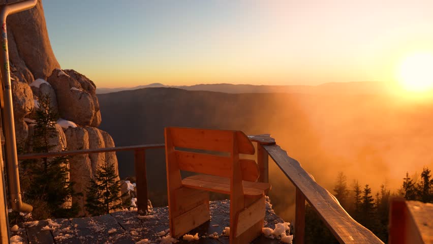 Hiker Walking Out Of Mountain Shelter And Watching Sunset From Scenic Terrace