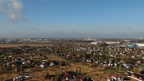 Drone Descending Vertically beside Communication Tower