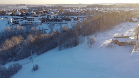 Drone Turning Left over Snowy Ski Resort