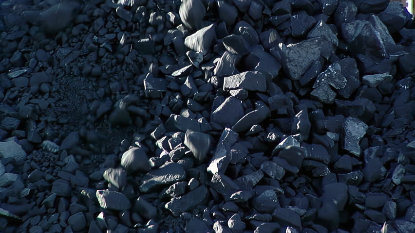 Iron Ore Chunks Falling From Conveyor, Mining Stockpile Close Up, Argentina - 4K