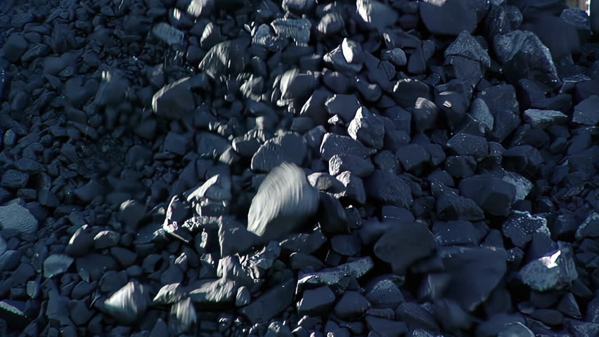 Iron Ore Chunks Falling From Conveyor, Mining Stockpile Close Up, Argentina - 4K