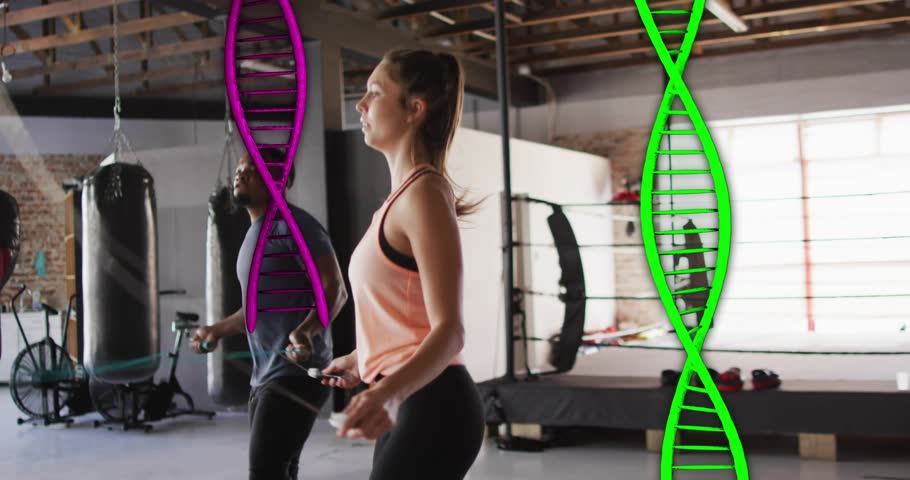 Two partners starting wrist rotations on ropes jumping for cardio as DNA helices framing partners. Duo, promo, motion, dynamic, fitness, boxing, gym