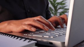 Close-up of a businesswoman's hands working on her laptop while holding an animated graphic with an upward-pointing arrow. - Powered by Shutterstock - Get 15% off with code: PIKWIZARD15
