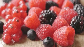 Composition of fresh red fruits including strawberries, blueberries, raspberries, blackberries, and red berries, highlighting nature, antioxidants, and healthy eating. - Powered by Shutterstock - Get 15% off with code: PIKWIZARD15