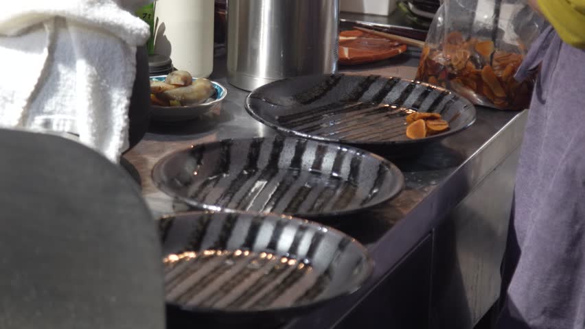 Image of a woman preparing a meal