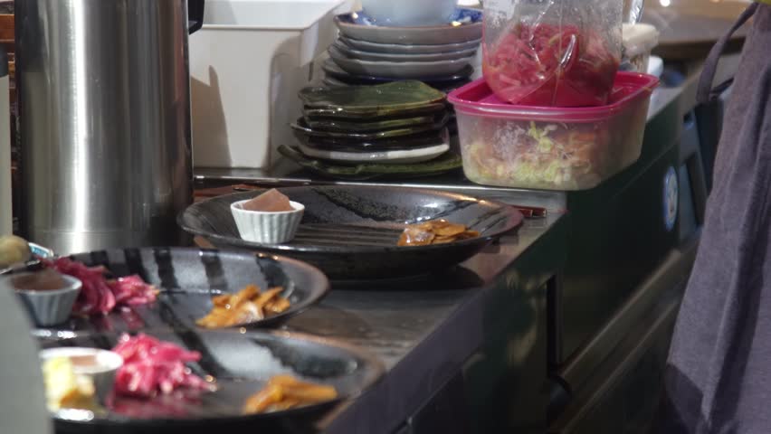 Image of a woman preparing a meal