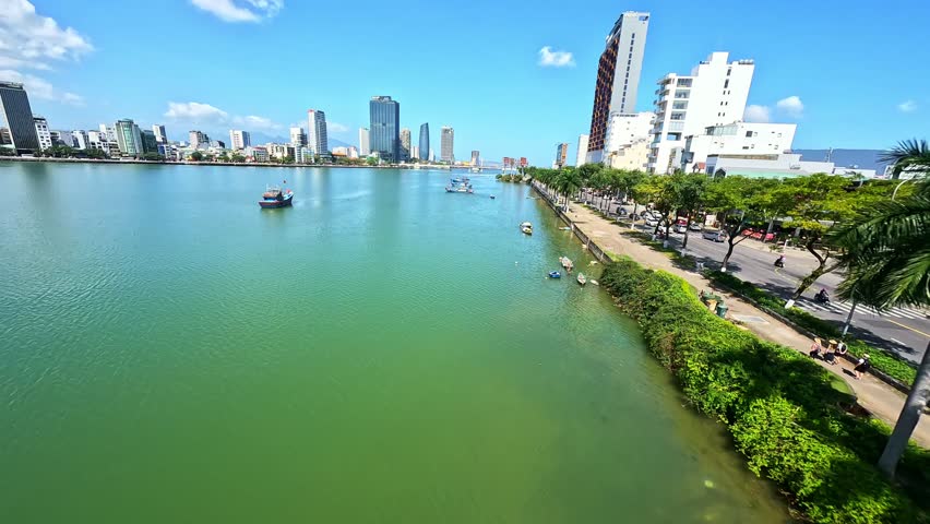 Dynamic FPV drone footage of Da Nang, Vietnam, featuring fast cinematic flights over tropical beaches, coastline, city skyline and surrounding mountains in Southeast Asia.