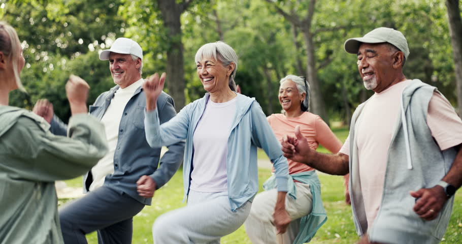Coach, senior group and exercise at park for functional fitness, cardio warm up or mobility workout. Retirement health, elderly people and happy with instructor outdoor for brisk walking and wellness