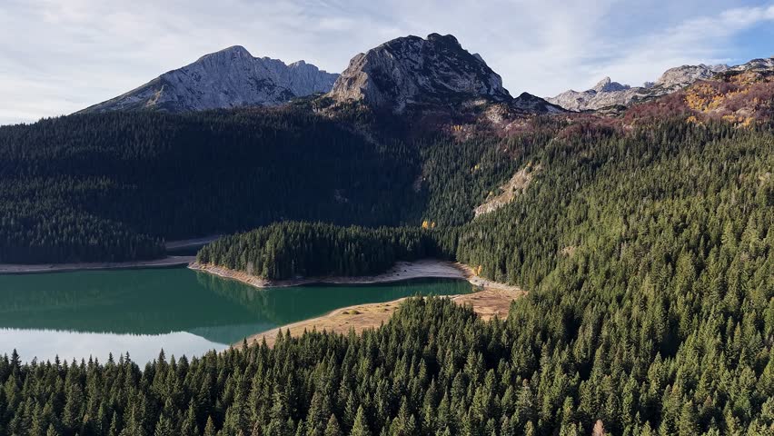 Autumn aerial view of the Durmitor mountain range and Black Lake.