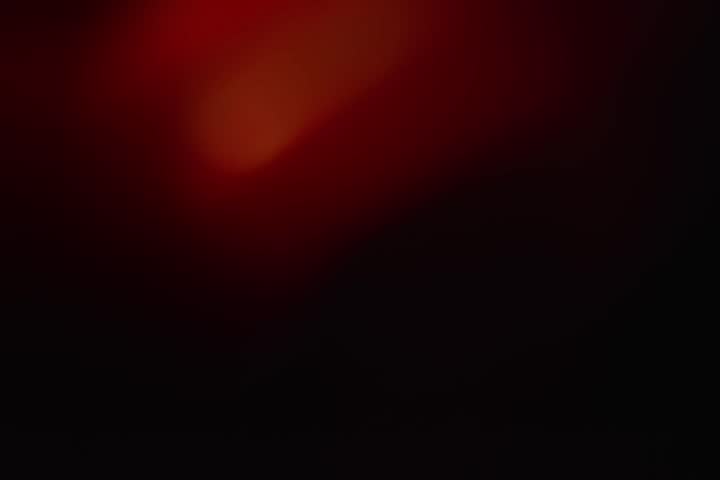 Dark Red Cinematic Light Leak Overlay. Moody red cinematic light leak overlay for video projects. Ideal for dramatic transitions, trailers, social media reels and creative visuals.
