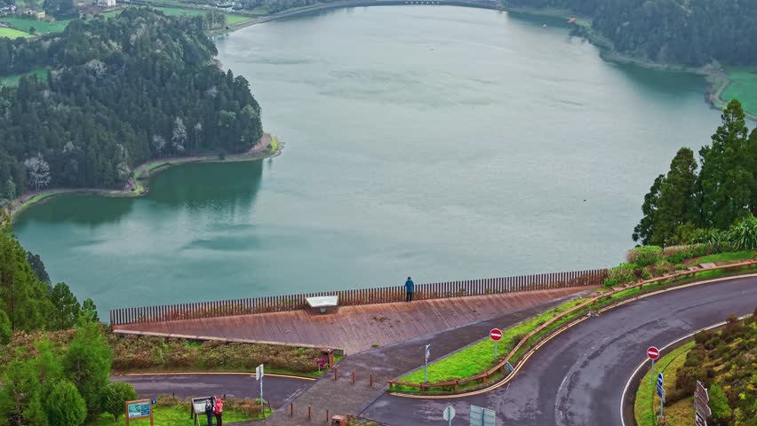 Aerial view of the beautiful lake Lagoa das Sete Cidades in a giant volcano caldera on Sao Miguel island, Azores, Portugal, showing an iconic natural landscape. Miradouro da Vista do Rei viewpoint