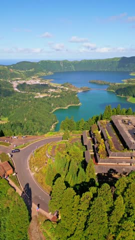 Sao Miguel, Azores, Portugal: The famous view of the Twin Lakes (Lagoa das Sete Cidades) with different colors inside a volcanic crater, seen from the Vista do Rei viewpoint (King