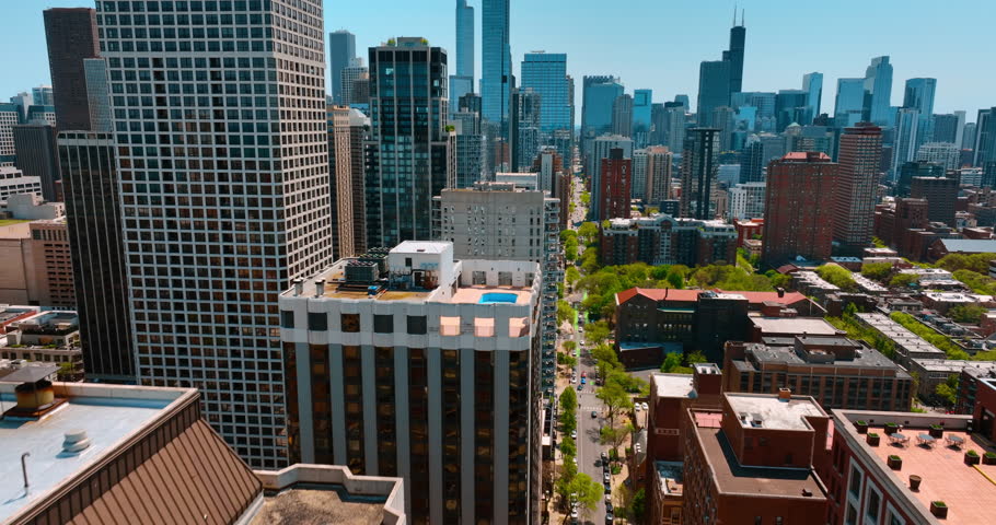 In the downtown of modern lively Chicago, Illinois, USA. View on the gorgeous skyscrapers of metropolis on sunny day.