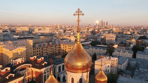 Drone Orbiting Cathedral Dome above City