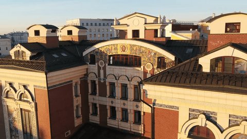 Drone Approaching Ornate Building Mosaic Facade