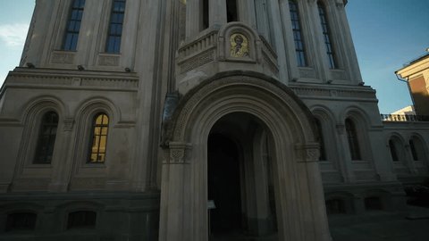 Drone Ascending Diagonally Church Entrance