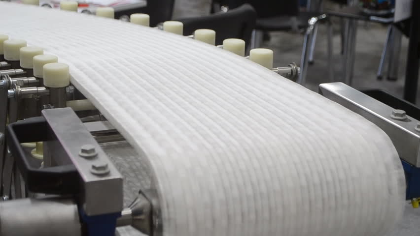 Modular belt rotary conveyor. Continuous movement system. Transportation of materials or products. Conveyors for moving objects. Production manufacture. Moving industrial belt. Connected plastic links