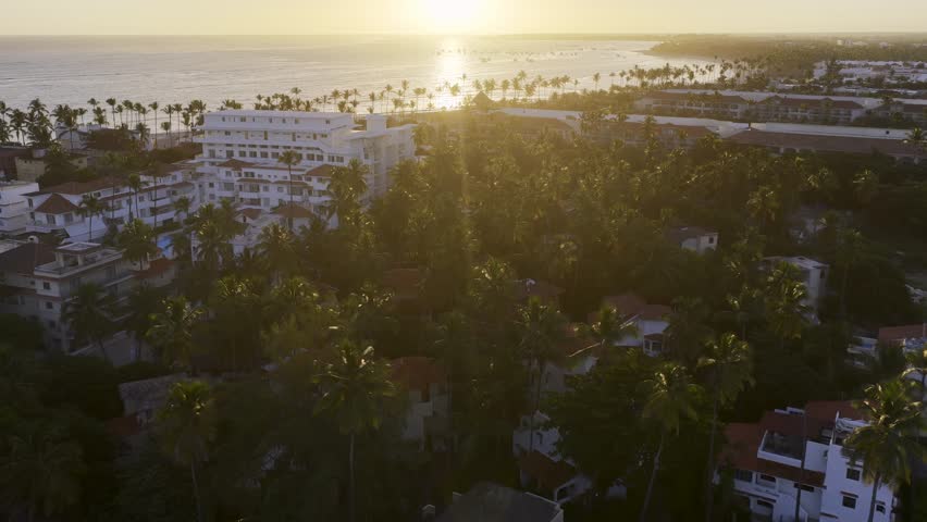Sunrise Beach At Bavaro In Punta Cana Dominican Republic. Sunrise Skyline. Beach Landscape. Resorts Buildings. Sunrise Beach In Bavaro In Punta Cana Dominican Republic. Nature Background.