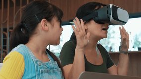 Granddaughter control laptop guide grandmother to dive in metaverse with VR. Senior adapt to technology activity communicate new generation kid cross generation gap strengthen family bond. Divergence. - Powered by Shutterstock - Get 15% off with code: PIKWIZARD15