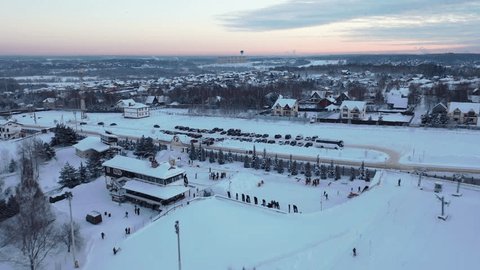Forward Drone Flight over Winter Residential Landscape