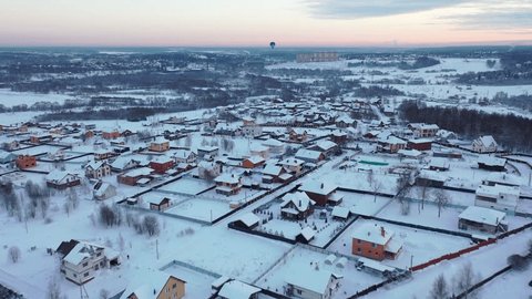 Forward Aerial Drone Flight over Winter Housing