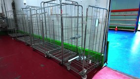 Roll container trolleys for picking orders in logistics warehouse - Powered by Shutterstock - Get 15% off with code: PIKWIZARD15