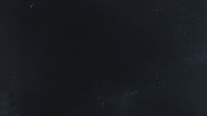Real Timelapse Shot of Frost Texture Forming on Glass, Black Background.