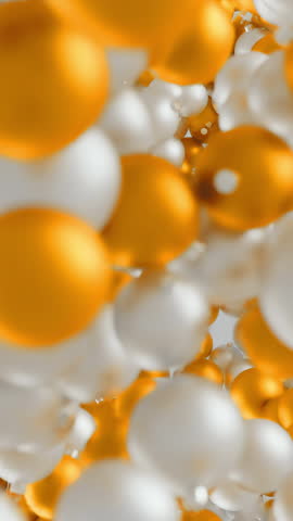 White and golden Christmas baubles fall and shatter across neutral background in top-down composition filling the frame