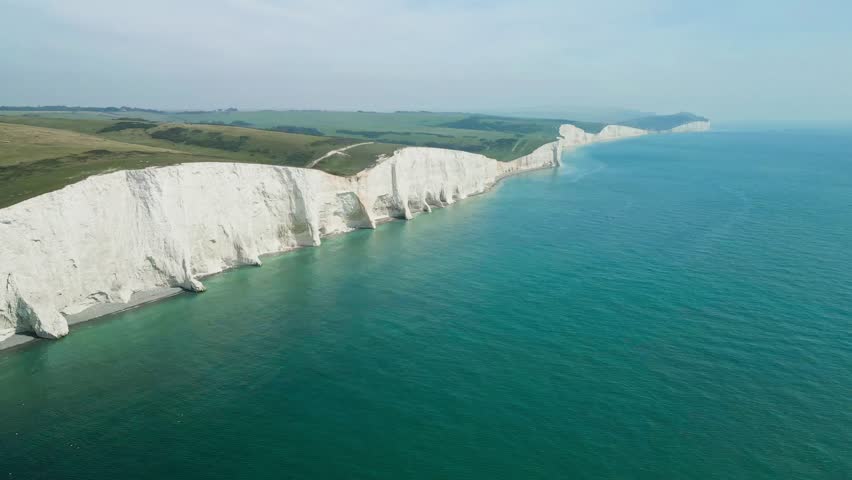 Aerial drone view over the famous, white cliffs of The Seven Sisters Dover, south England.