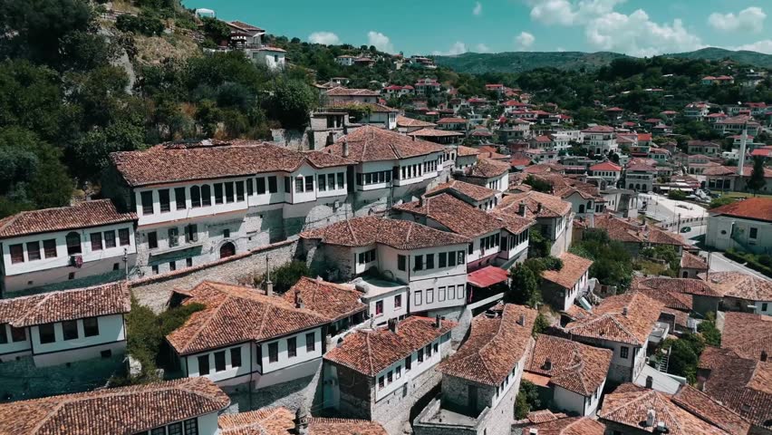 Beautiful establishing shot of ancient houses on hillside in Berat, Albania.