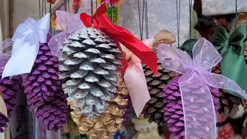 Christmas decoration in the form of pine cones on a Christmas tree.