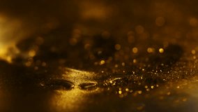 Abstract golden macro background with shimmering glitter particles and soft bokeh lights. - Powered by Shutterstock - Get 15% off with code: PIKWIZARD15