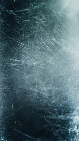 Abstract Blue Grunge Fast Motion Background with Fine Scratches, Vertical Video Overlay for Mobile Content, Dark Cinematic Film Grain Texture Animation
