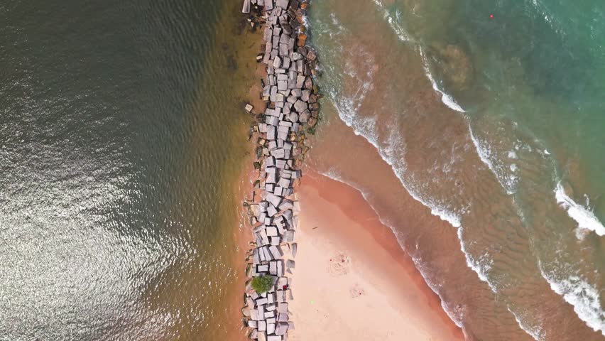 Top down aerial shot of New Buffalo Beach, Michigan, with stunning views over Lake Michigan and the peaceful shoreline on a sunny summer day