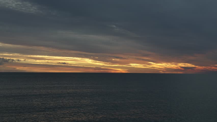 Evpatoria (Crimea, Crimean Peninsula) Clouds near the Black Sea coast during sunset.