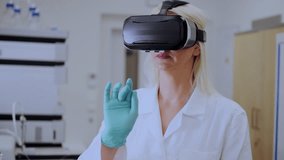 Professional scientist using VR headset in chemistry lab for interactive molecular modeling, representing future of research and immersive technology. - Powered by Shutterstock - Get 15% off with code: PIKWIZARD15