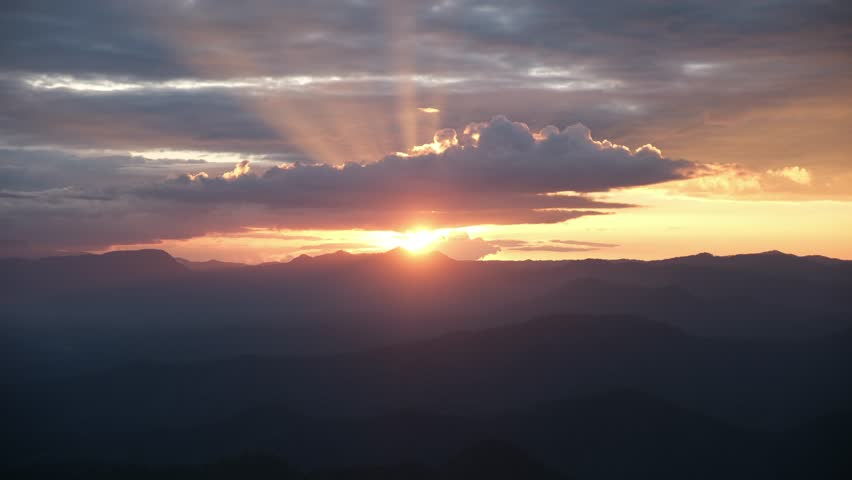 Landscape image of mountains view and sunset sky on cloudy day