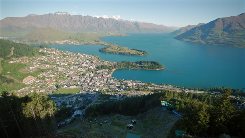 4K Video of Queenstown Panorama at golden hour, New Zealand, South Island. View from Queenstown Skyline, main attraction in the alpine city. Queenstown, New Zealand.