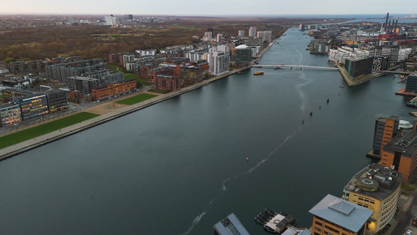 Panoramic drone shot around the Sydhavn river, autumn in Copenhagen, Denmark