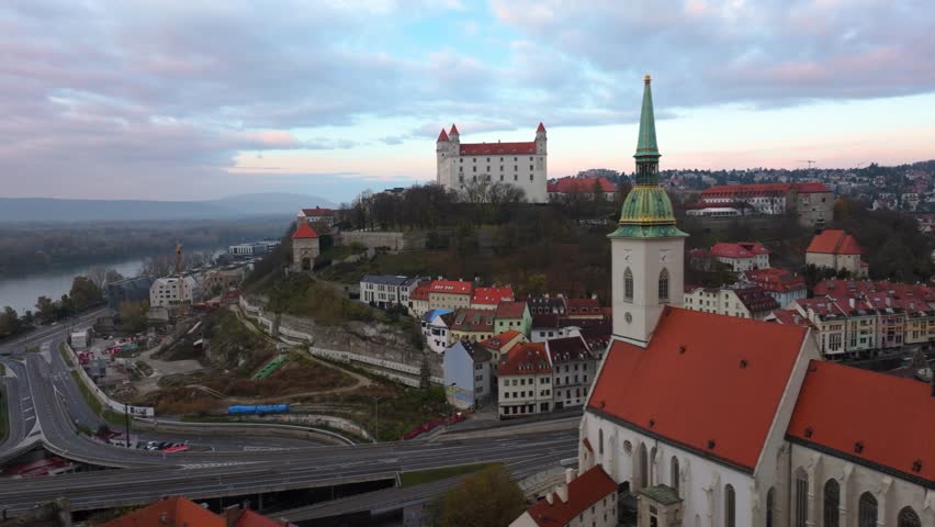 4K cinematic drone footage of St. Martin’s Cathedral in Bratislava, revealing the architectural beauty, bustling surroundings, and historic atmosphere of central Bratislava._056