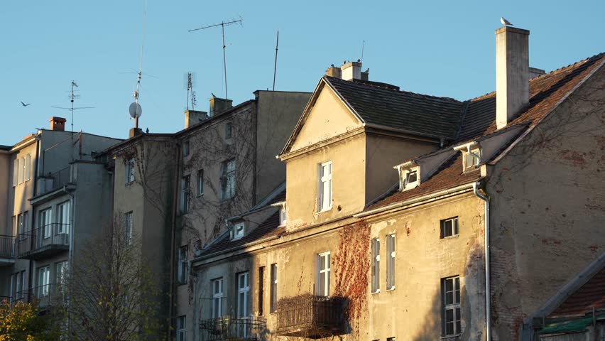 Gdynia city street with old townhouses and rustic vintage architecture