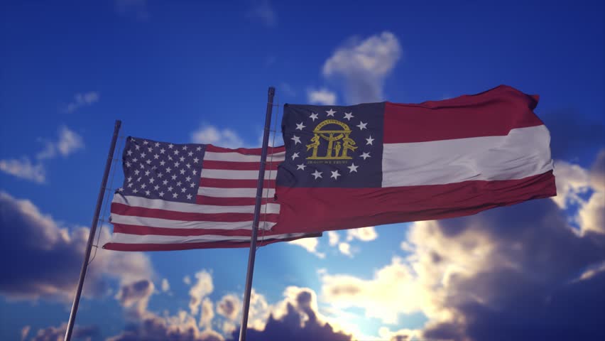 Patriotic Display of USA and Georgia State Flags Against Dramatic Sky