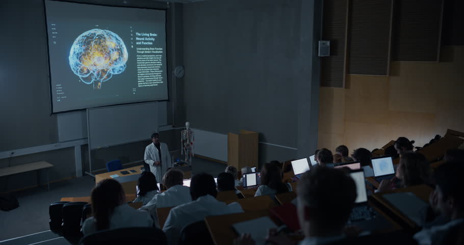 Neuroscience Professor in a Lab Coat Leads an Brain Imaging Lecture for Diverse Medical Students University Auditorium, 3d Neural Projection, Interactive Higher Education and Clinical Training