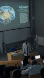 Vertical Screen: Classroom Neuroscience Lecturer Explaining Live Brain Connectivity on 3d Scan, Guiding a Diverse Group of University Students Who Follow the Complex Neural Pathways on Laptops - Powered by Shutterstock - Get 15% off with code: PIKWIZARD15
