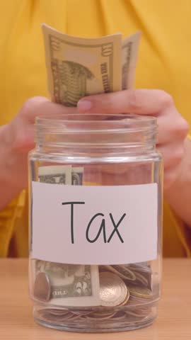 Vertical Video of Saving Money for Tax