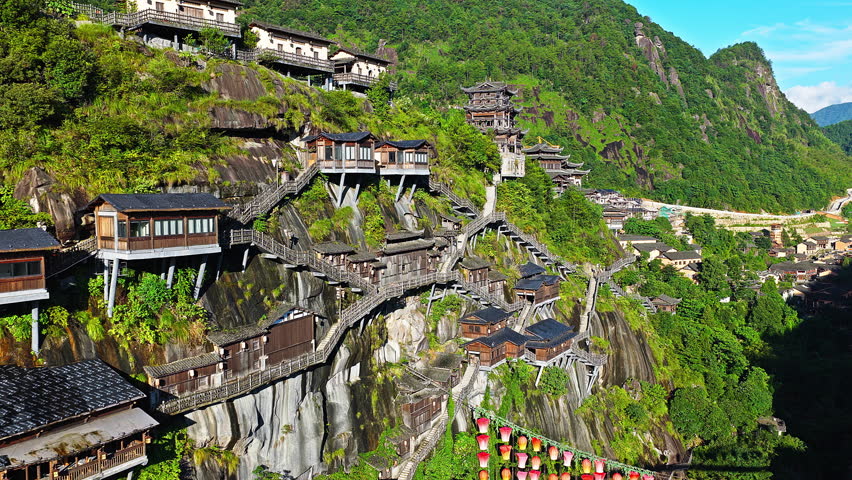 Beautiful ancient villages and traditional wooden buildings are built on the cliffs. The famous Wangxiang Valley Scenic Area is located in Jiangxi, China.