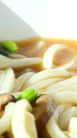 Noodle soup bowl Tasty spicy Asian noodle bowl.. Eating Chinese Ramen Soup. Cooked Delicious Instant Noodles With Vegetables. Asian Dinner Cooking. Quick Ramen With Dry Vegetables. Chinese Food