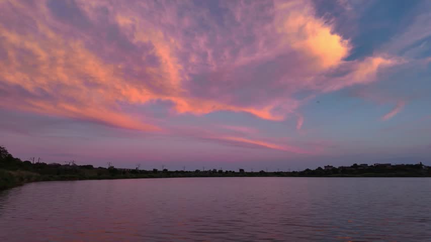 Beautiful sunset clouds over lake